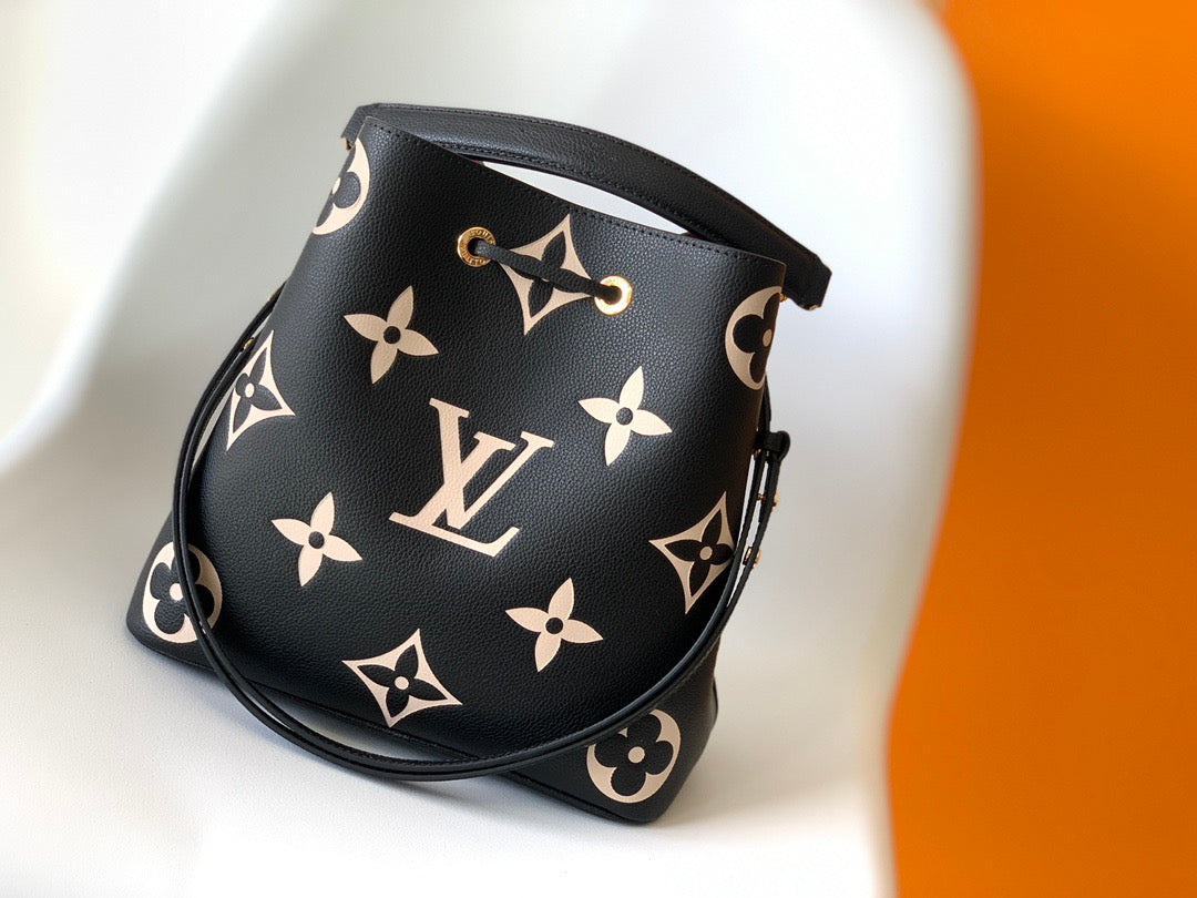 NéoNoé MM Bi-color Monogram Empreinte Leather Medium Bucket Bag M45497