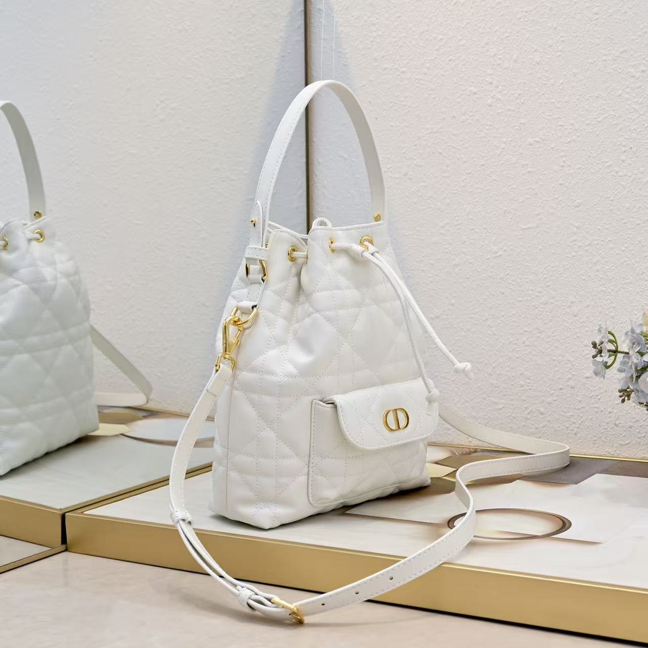 Small DR Caro Bucket Bag Powder Macrocannage Lambskin