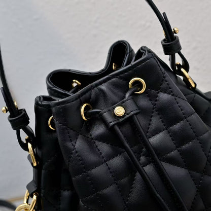 Small DR Caro Bucket Bag Powder Macrocannage Lambskin