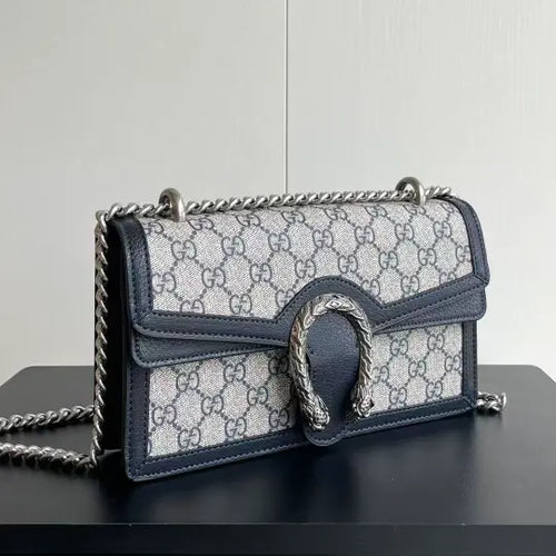 Dionysus series Dionysus bag with monogram and leather accents
