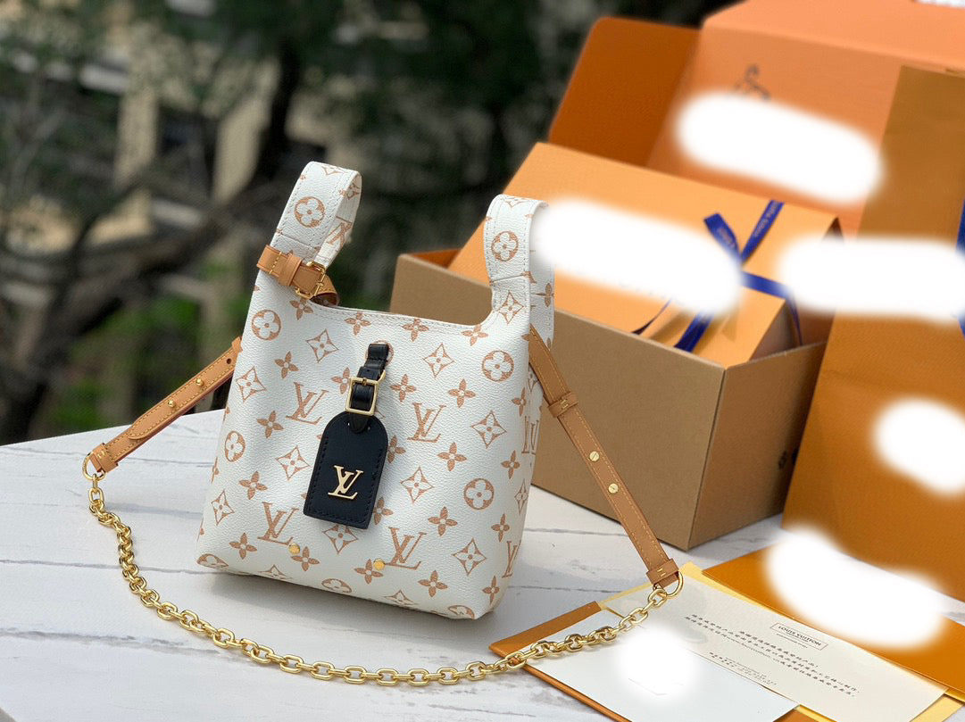 Atlantis BB Monogram Dune Handbags M24408
