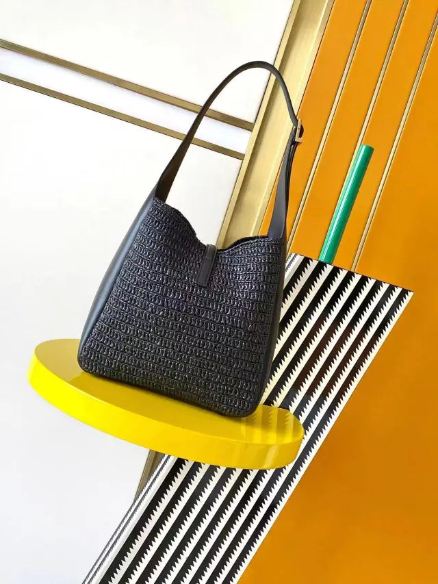 LE 37 woven raffia and vegetable-tanned leather bag
