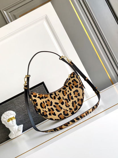 Arqué printed leather mini shoulder bag 1BC194_2C7B_F0151_V_OOM