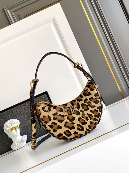 Arqué printed leather mini shoulder bag 1BC194_2C7B_F0151_V_OOM