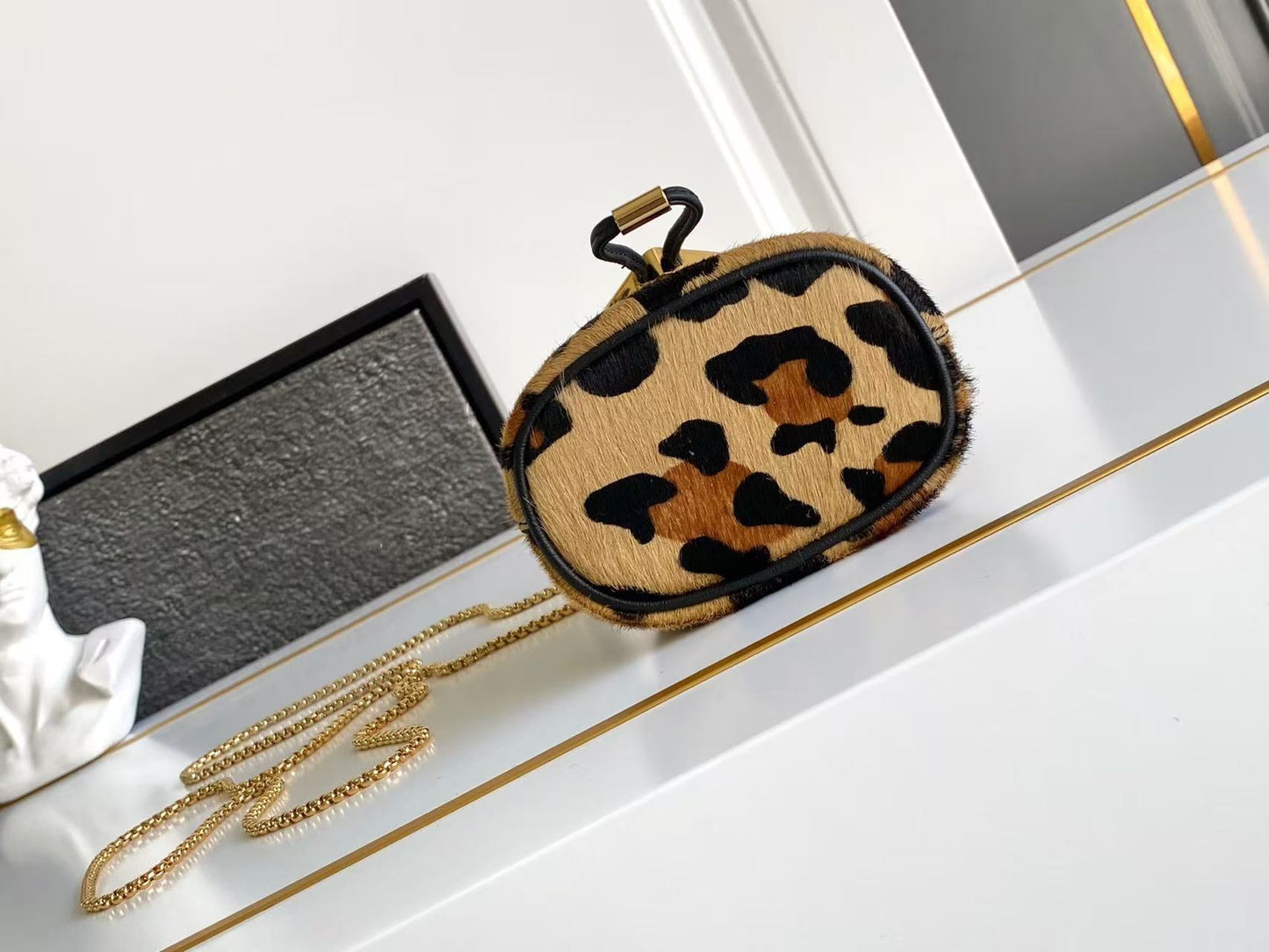 Printed leather mini pouch