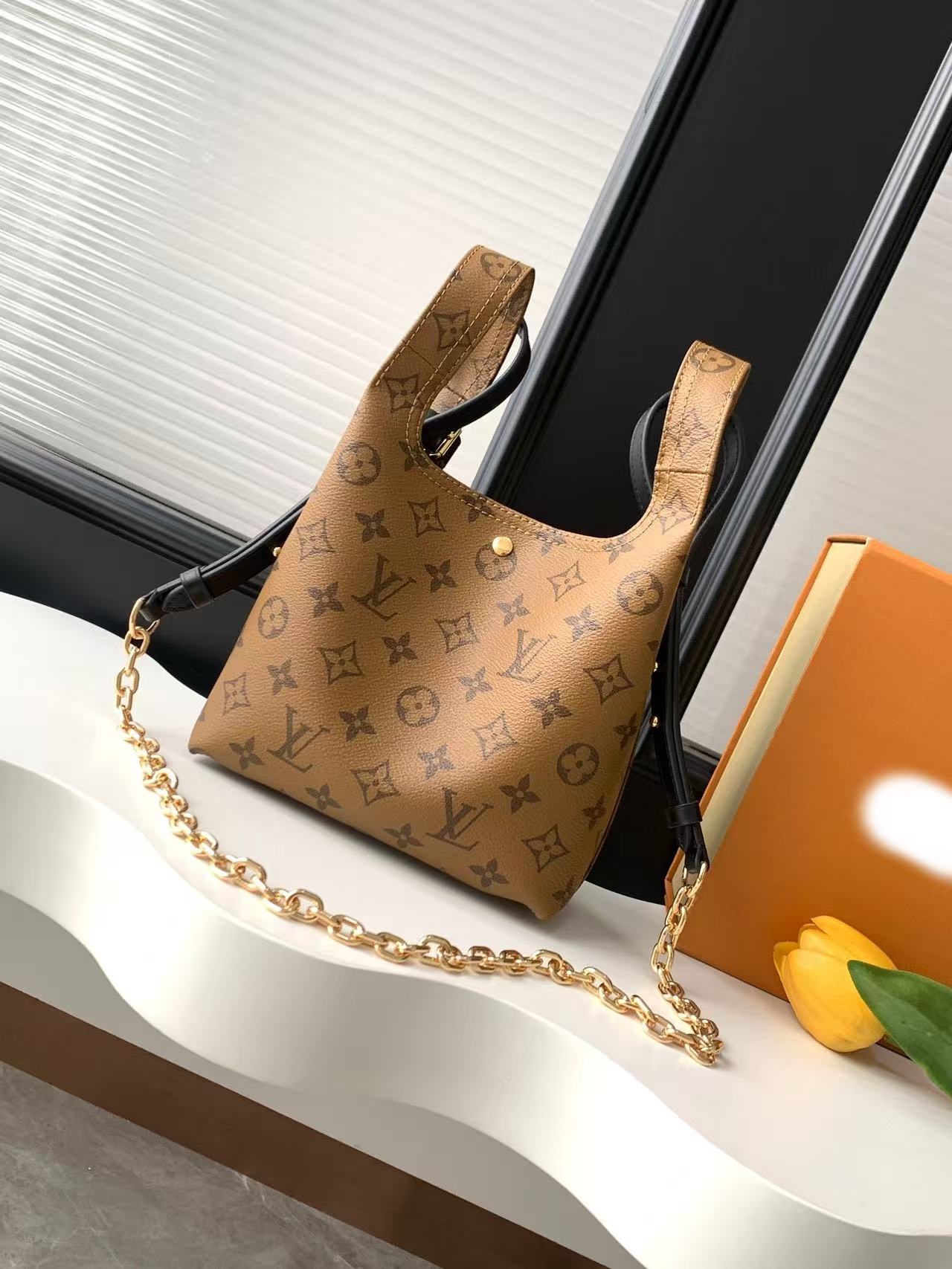 Monogram Reverse Canvas Atlantis BB Handbags M46816