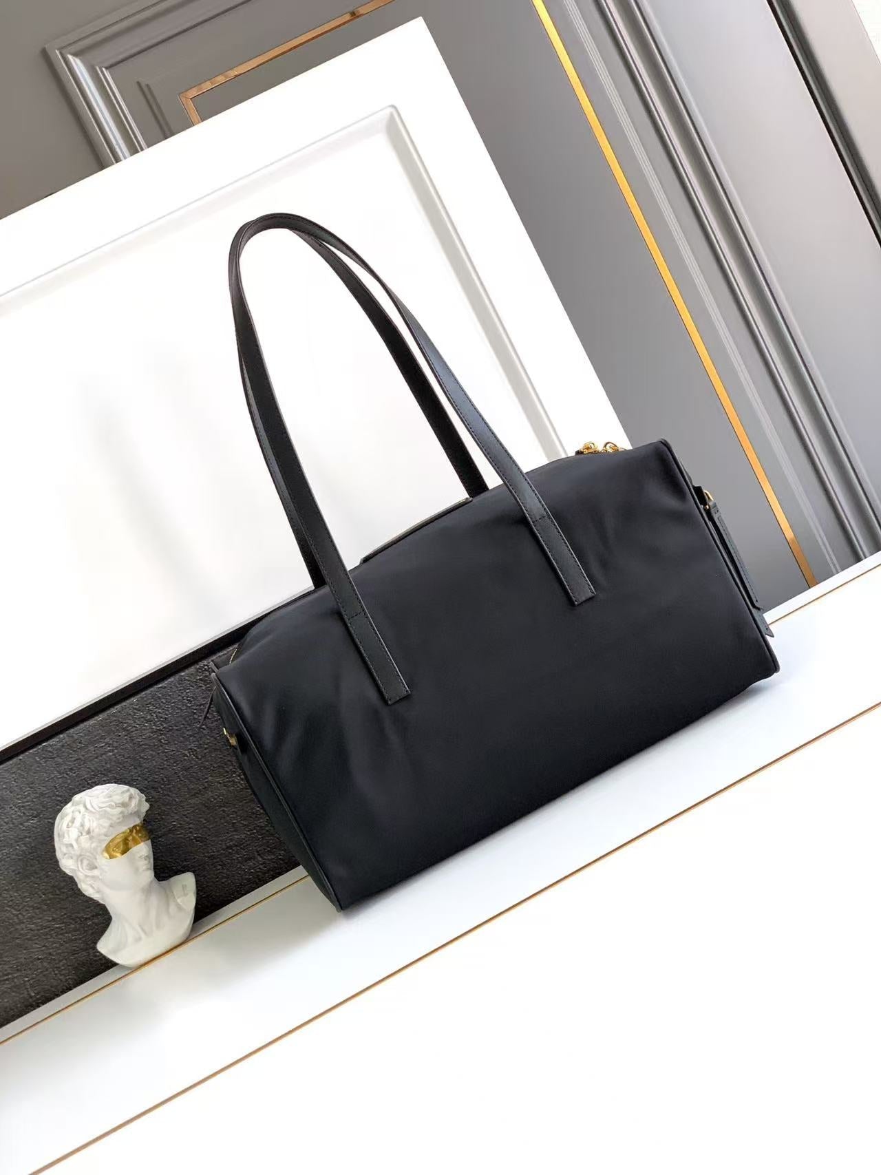 Large Re-Nylon Top-Handle Bag with Padlock 1BB135_R064_F0002