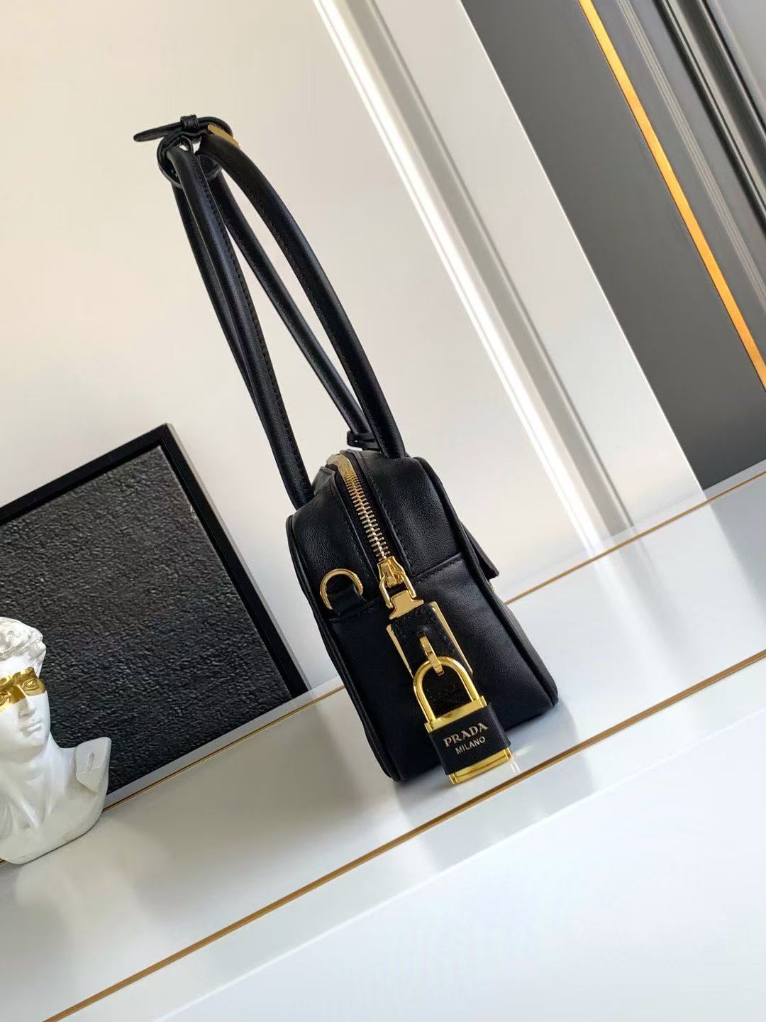 Re-Nylon and Leather Small Top-Handle Bag with Padlock 1BB133_2C8Q_F0002_V_ODO