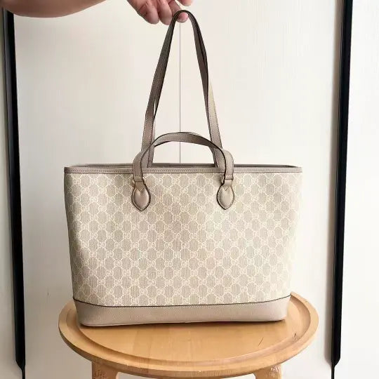 Ophidia series medium oatmeal-colored tote bag