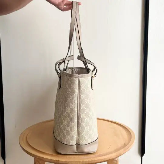 Ophidia series medium oatmeal-colored tote bag