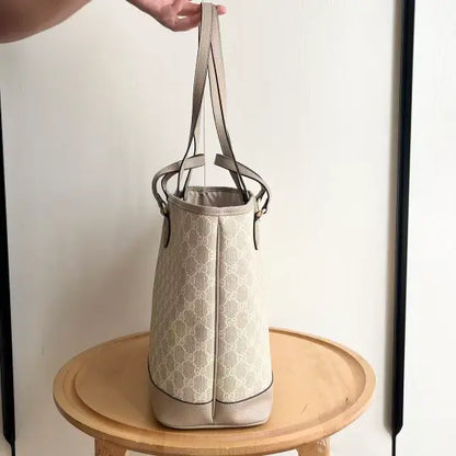 Ophidia series medium oatmeal-colored tote bag