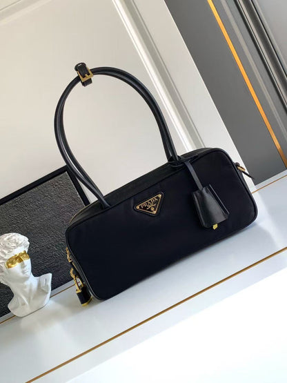 Re-Nylon and Leather Small Top-Handle Bag with Padlock 1BB133_2C8Q_F0002_V_ODO