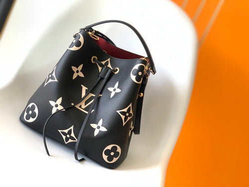 NéoNoé MM Bi-color Monogram Empreinte Leather Medium Bucket Bag M45497