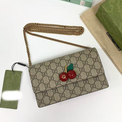 GG Supreme canvas mini bag with cherries