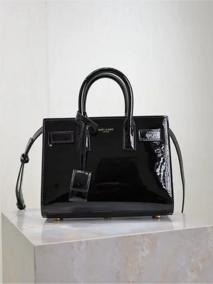 Sac De Jour black patent leather handbag