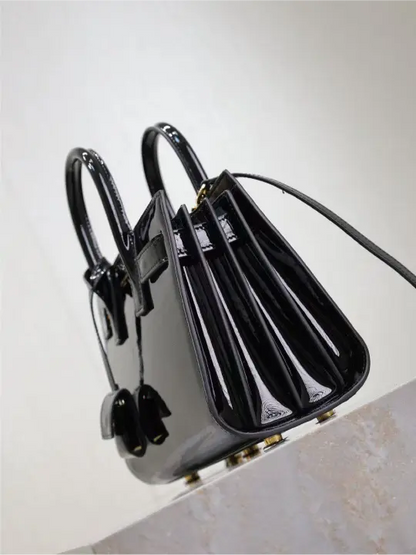 Sac De Jour black patent leather handbag