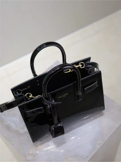 Sac De Jour black patent leather handbag