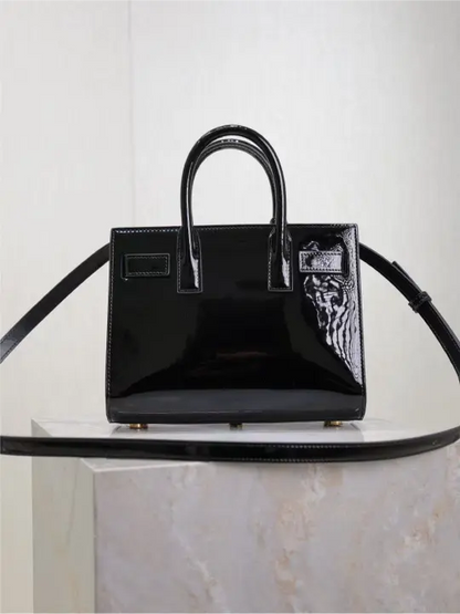 Sac De Jour black patent leather handbag