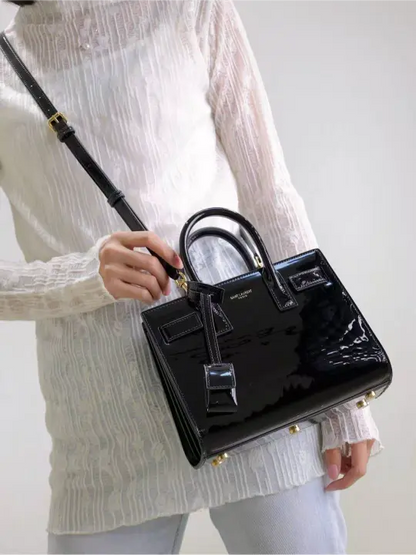 Sac De Jour black patent leather handbag