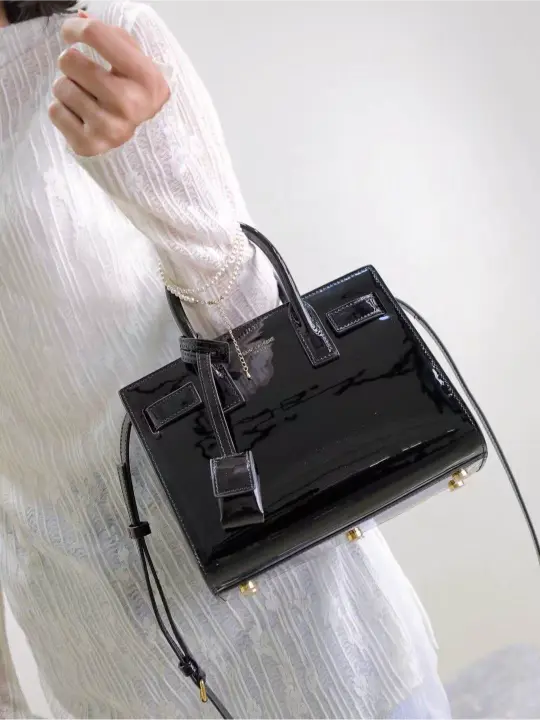 Sac De Jour black patent leather handbag