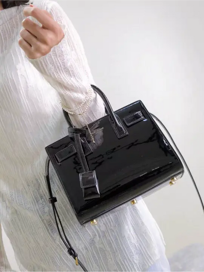 Sac De Jour black patent leather handbag