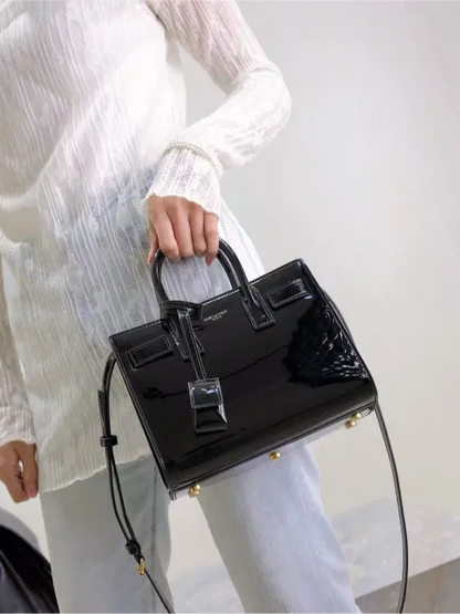 Sac De Jour black patent leather handbag