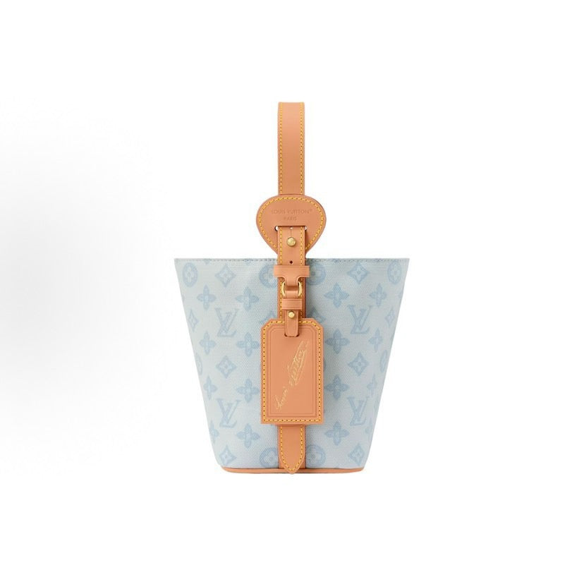 2026 All In BB Bucket Bag in Messenger Blue, crafted from coated canvas with natural cowhide trim M27529
