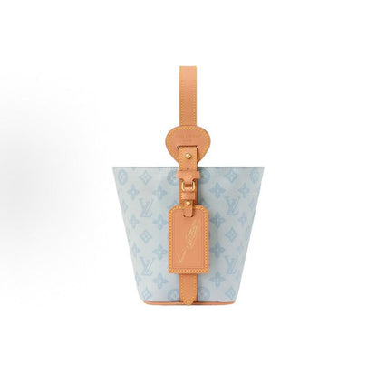 2026 All In BB Bucket Bag in Messenger Blue, crafted from coated canvas with natural cowhide trim M27529