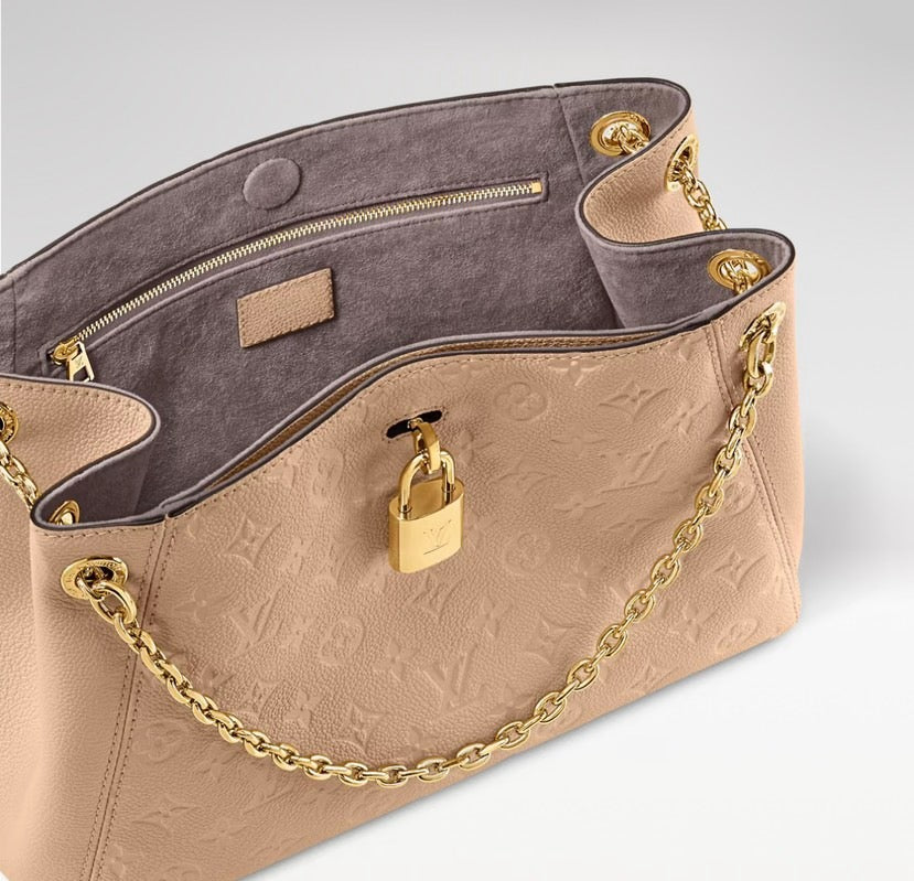 2026 Anytime PM Handbag in Dune Monogram Empreinte Embossed Leather M14659