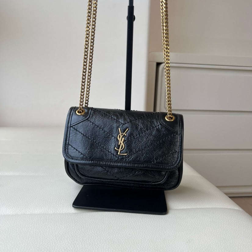 2026 Niki Mini Chain Bag in Black Vintage Waxed Leather 8460870EN071000