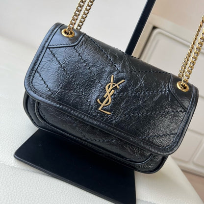2026 Niki Mini Chain Bag in Black Vintage Waxed Leather 8460870EN071000