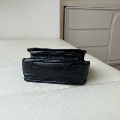 2026 Niki Mini Chain Bag in Black Vintage Waxed Leather 8460870EN071000